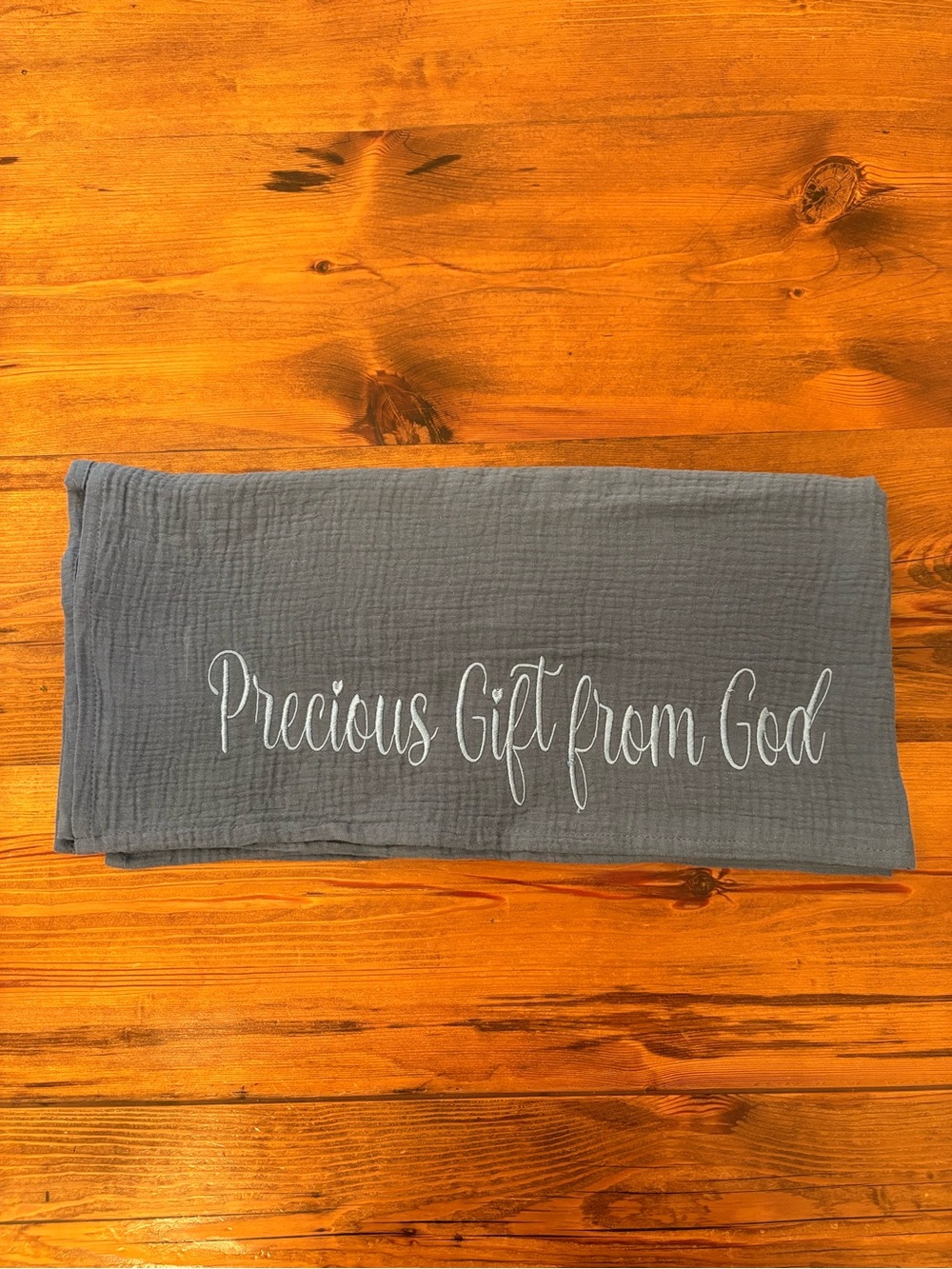 Embroidered blue baby blanket with "Precious Gift from God"